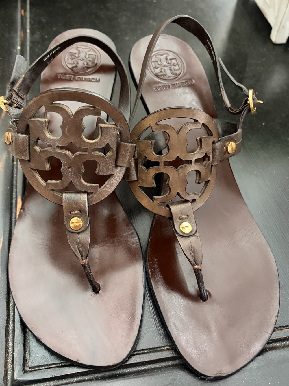Woman’s Tory Burch brown wood sandals. Size 9.5M. Pre-owned condition.
